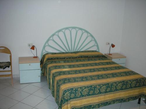 Letto o letti in una camera di Case Vacanza Fenicotteri