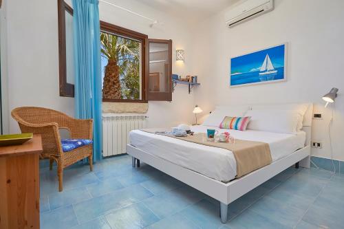 Postel nebo postele na pokoji v ubytování Villa Gabbiano - Scopello-Villas