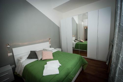 Ein Bett oder Betten in einem Zimmer der Unterkunft Monfalcone by Arbaspàa