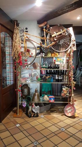 a room with a bike on a shelf at Hotel Colegiata in Santillana del Mar