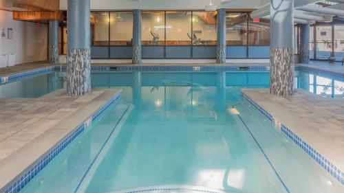 a large swimming pool with blue water at Atlantic Oceanside Hotel & Conference Center in Bar Harbor