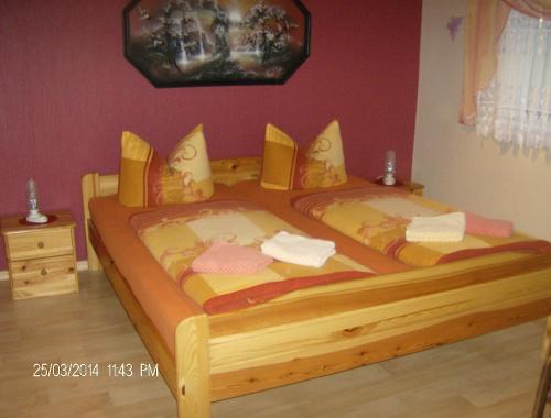 Кровать или кровати в номере Ferienhaus am Bismarckturm in Burg