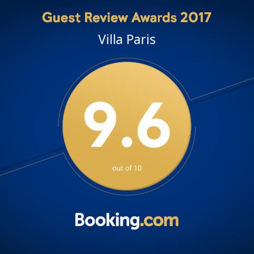 a yellow circle with the words guest review awards villa paris at Villa Paris in Hisarya