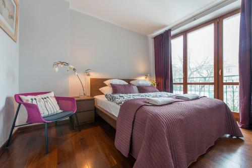 Postel nebo postele na pokoji v ubytování P&O City Center Apartments
