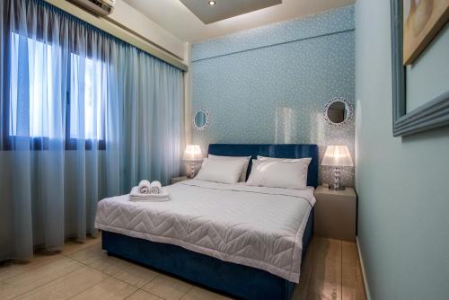 Säng eller sängar i ett rum på Callista Luxury Residences