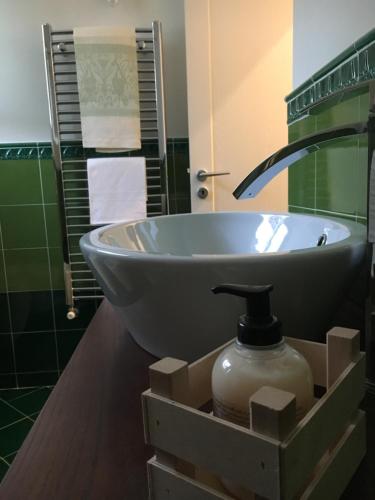 a bathroom with a bowl sink and a shower at MD House - Amalfi Coast in Maiori