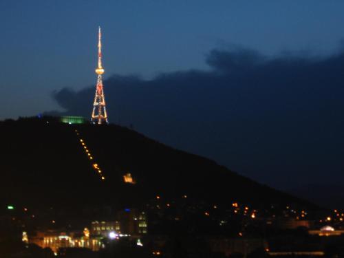 a view of the eiffel tower at night at Mia B&B Old Tbilisi in Tbilisi City