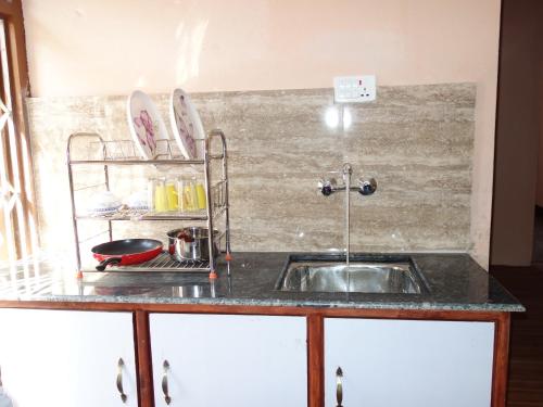 Dapur atau dapur kecil di Bodhi Apartment hotel