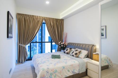 Ένα ή περισσότερα κρεβάτια σε δωμάτιο στο Mcity Jalan Ampang
