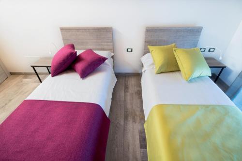 Postel nebo postele na pokoji v ubytování Agriturismo Camisi qh