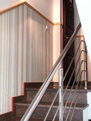 a set of stairs in a building at Smještaj Natalija in Osijek