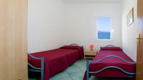 Cama o camas de una habitación en Lumia Case Vacanze
