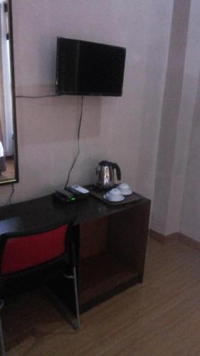 RF Hotelにあるテレビまたはエンターテインメントセンター