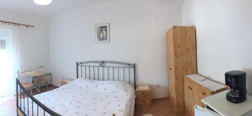 Postel nebo postele na pokoji v ubytování Guesthouse Tariba