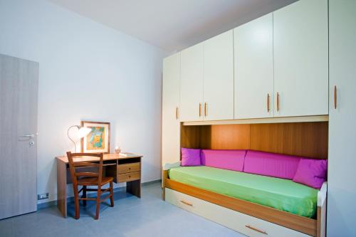 Postel nebo postele na pokoji v ubytování Gaeta apartament