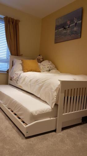 Katil atau katil-katil dalam bilik di St Marks Cottage