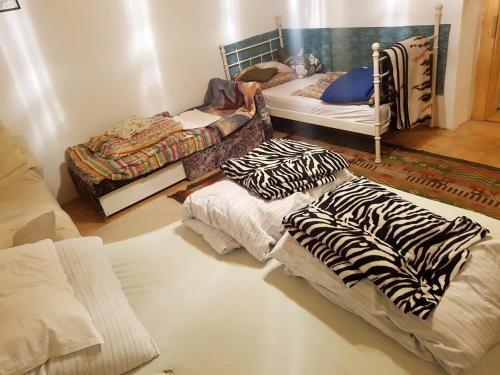 Postelja oz. postelje v sobi nastanitve Kúti Vendégház