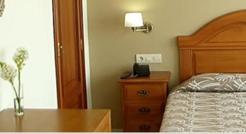 Hotel Bruselasにあるベッド