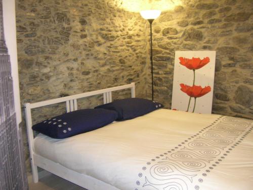 En eller flere senge i et værelse på Casa La Rosa
