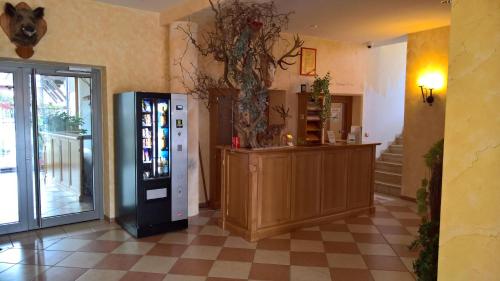 a shop with a vending machine in a room at Gasthof Ulrich Meyer in Landshut