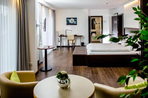 Postel nebo postele na pokoji v ubytování Hotel Bolte