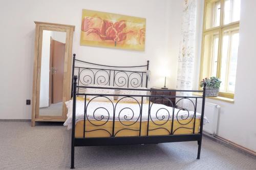 Postel nebo postele na pokoji v ubytování Apartmány V Podzámčí II.