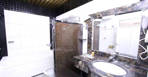 A bathroom at Hayat Jazan Furnished Units