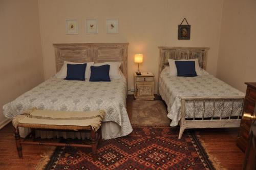 מיטה או מיטות בחדר ב-Sta. Marta B&B