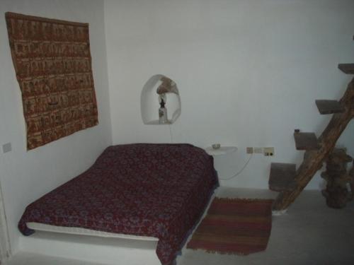 Postel nebo postele na pokoji v ubytování Casa Madonia