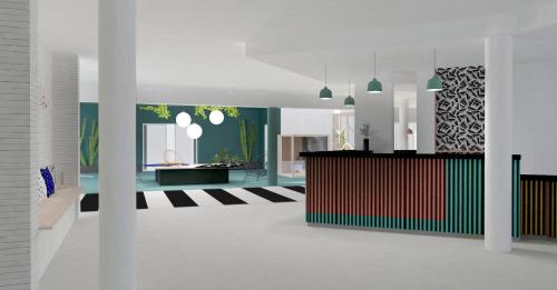 une salle avec un hall doté d'un comptoir et d'un miroir dans l'établissement ibis Styles Marseille Plan de Campagne, aux Pennes-Mirabeau