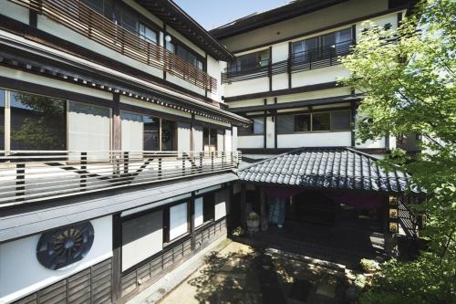 Balkón nebo terasa v ubytování Takamiya Ryokan Miyamaso