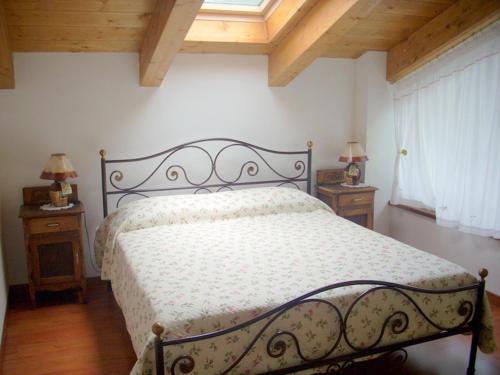 Postel nebo postele na pokoji v ubytování Maggiociondolo