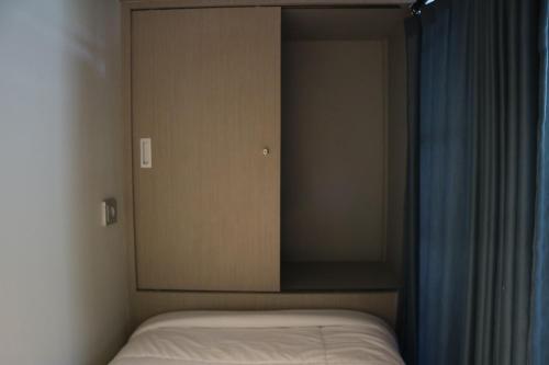 Postel nebo postele na pokoji v ubytování Home-Bience Hostel