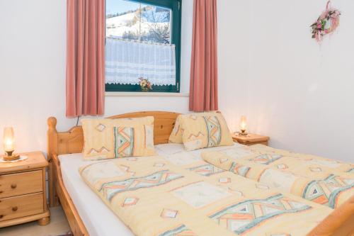 Säng eller sängar i ett rum på Appartement Monika Schwaiger