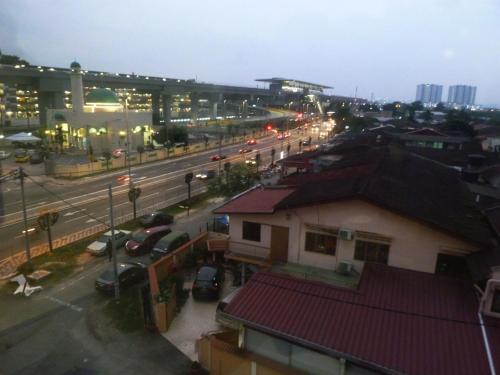 a view of a city street at night at The b'Hotel in Kajang
