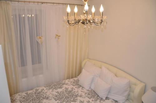 Posteľ alebo postele v izbe v ubytovaní Apartament SOLEIL Kołobrzeg