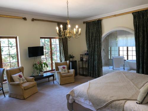 TV o dispositivi per l'intrattenimento presso Boutique Villa Guesthouse