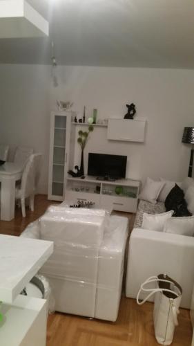 Un lugar para sentarse en Apartman -stan u centru