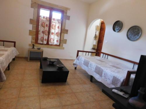 Кровать или кровати в номере Villa Leonton with a private pool
