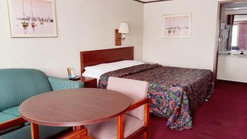 מיטה או מיטות בחדר ב-Stay Inn