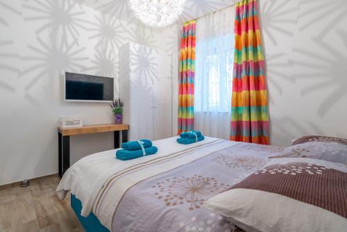 Ένα ή περισσότερα κρεβάτια σε δωμάτιο στο Petra design apartment