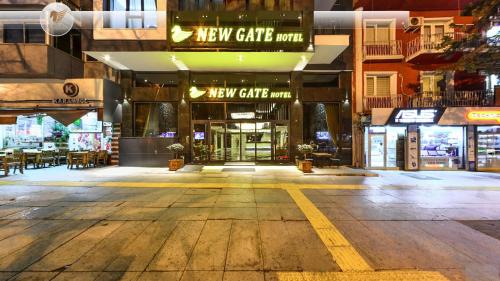 an empty city street with a new gate mall at New Gate Hotel in Ankara