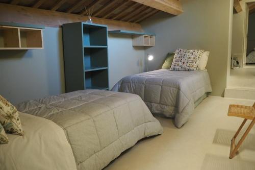 Postel nebo postele na pokoji v ubytování Residenza Corso Baccio