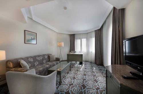 TV a/nebo společenská místnost v ubytování Xanadu Resort - High Class All Inclusive
