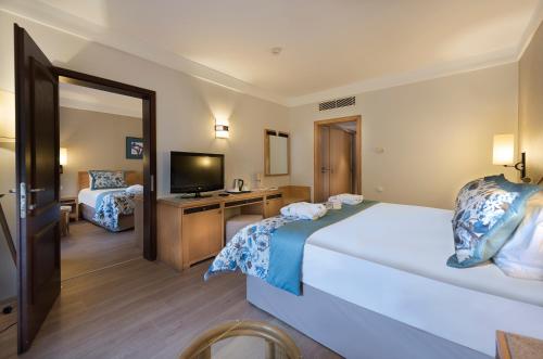 TV a/nebo společenská místnost v ubytování Xanadu Resort - High Class All Inclusive