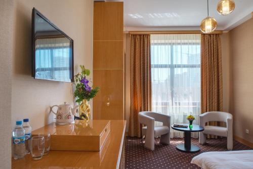 Кровать или кровати в номере Ark Palace Hotel & SPA