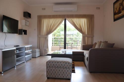 TV i/ili multimedijalni sistem u objektu AMB Apartments