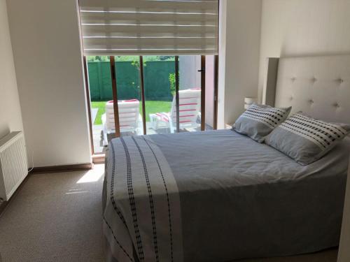 Casa en Condominio Costa Pucónにあるベッド