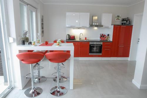 A kitchen or kitchenette at Apartments Tomana
