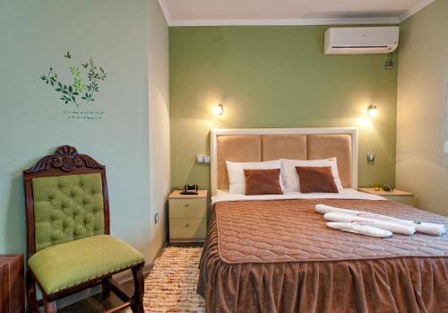 Llit o llits en una habitació de Garni Hotel Lama
